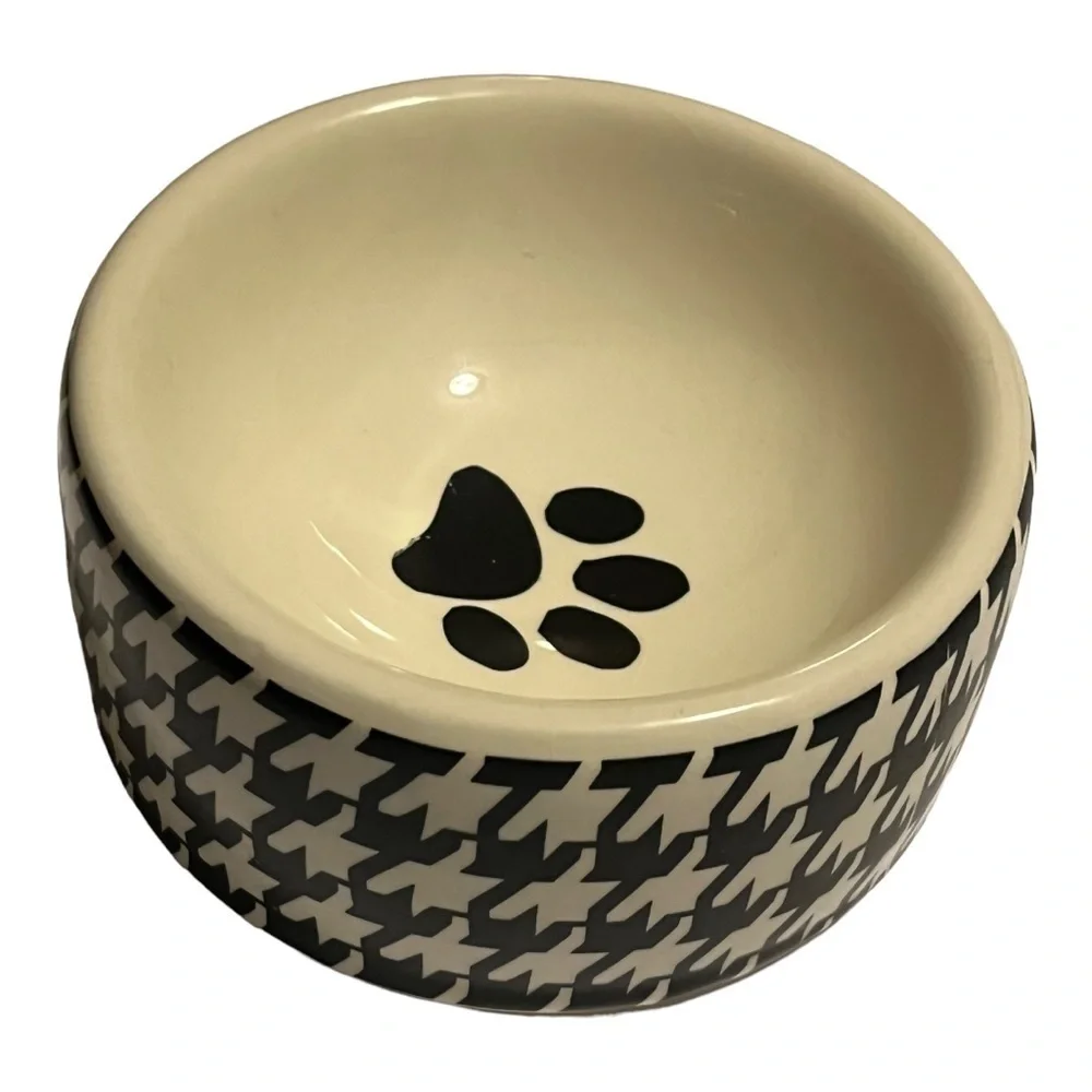 Houndstooth print Ceramic dog bowl black and white  paw print inside.